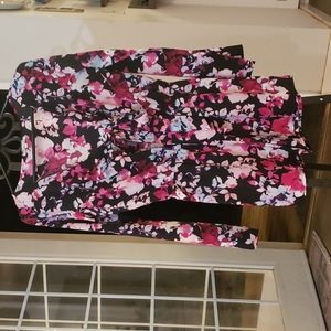 CHARLOTTE RUSSE romper with a deep V-neck with Tie.